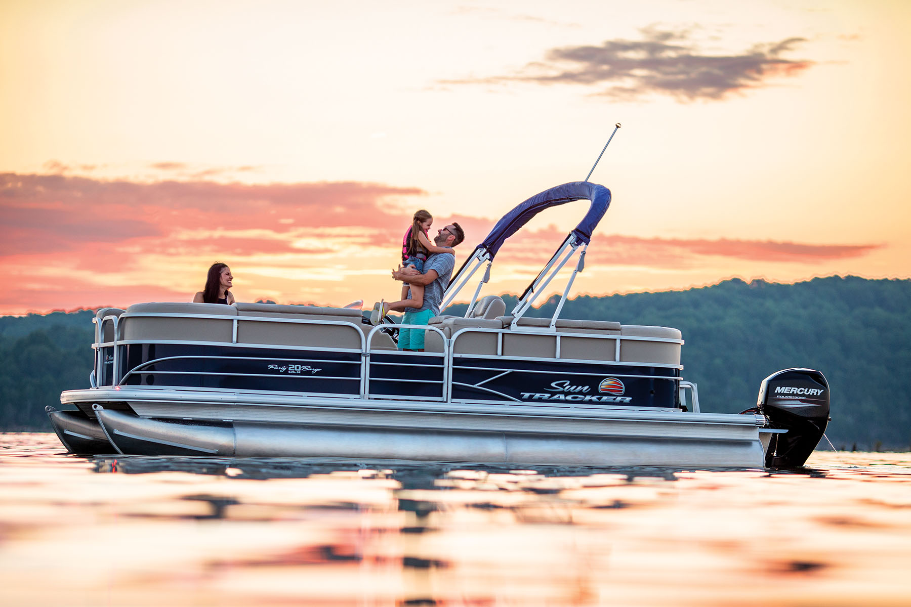 girls hugging on pontoon