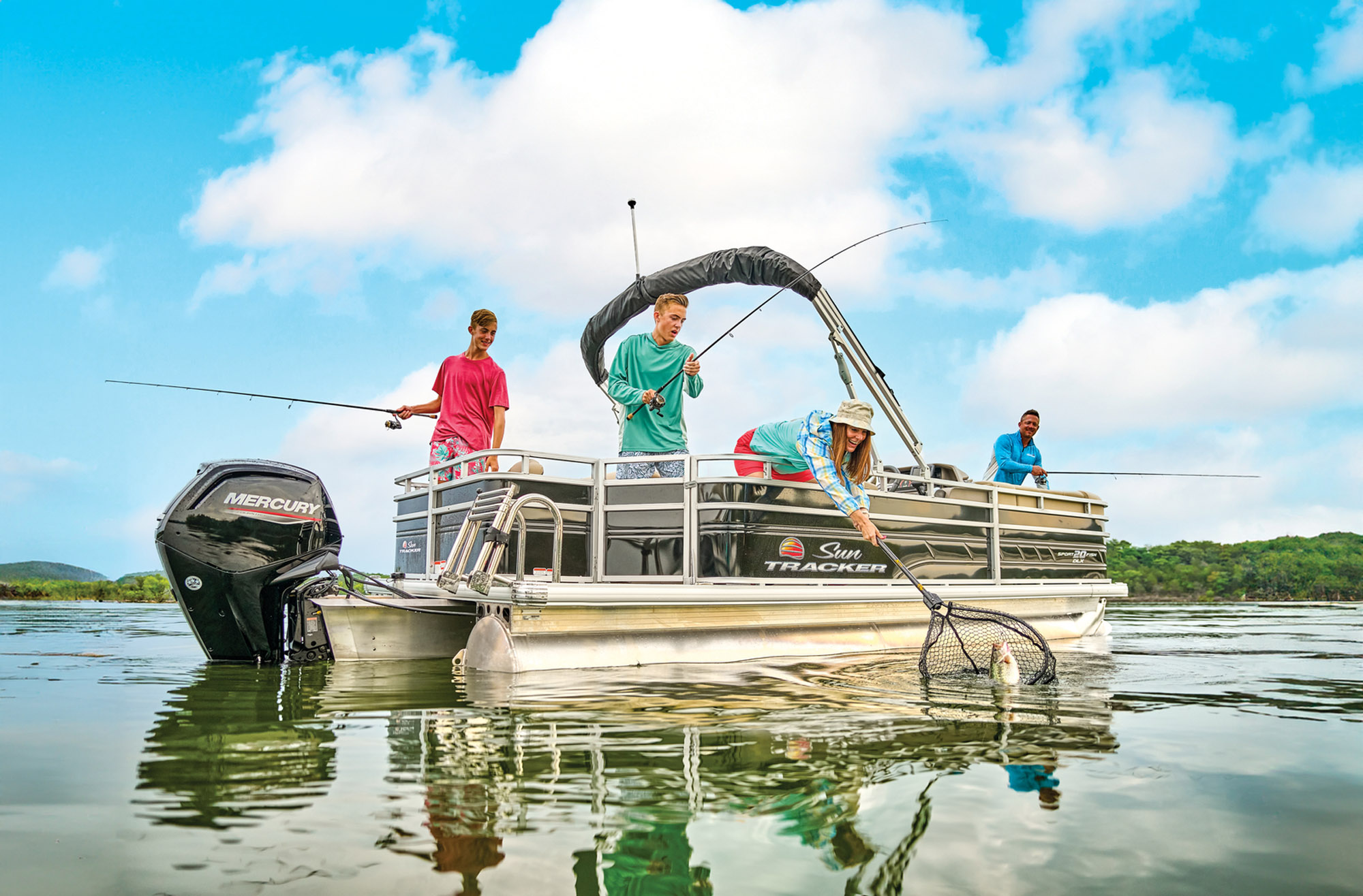 girls hugging on pontoon